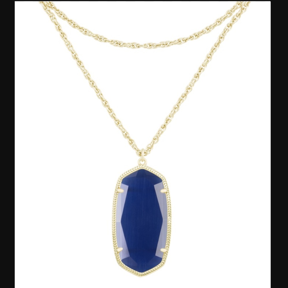 Kendra Scott Rae necklace. Faceted navy blue cats eye stone with gold hardware